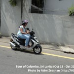 SriLanka tour - Woman on bike